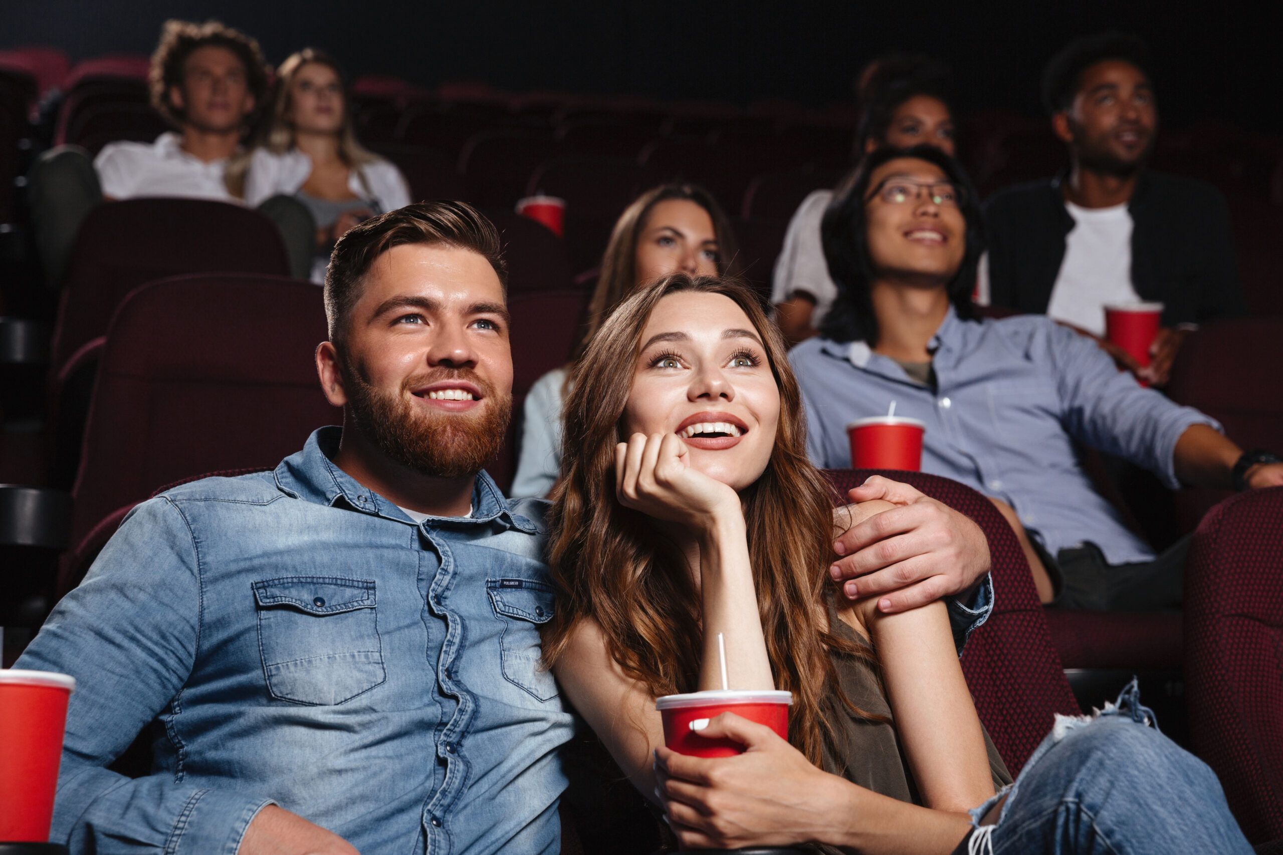 couple sitting in movie theater watching movie